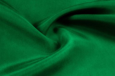 Arka plan doku, desen. Kalın kalın ipek kumaş yeşildir. T