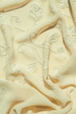 Gauss tasarımcılar için uygun bulanık. Doku, arka plan, desen. Kadın renk şal. Altın başak. Limon kremalı. Navajo beyazdır. Eski altın. ipek kumaş.