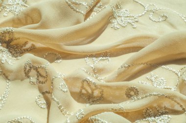 Doku, arka plan, desen. Kadın renk şal. Altın Başak. L