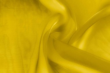 Doku, arka plan, desen. Sarı şeffaf ipek kumaş. Güneş Sarı ipek Charmeuse saten, 