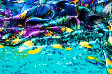 Doku, kumaş, arka plan. Kadın eşarp. İpek kumaş mavi, çiçek kalıptır. Soyutlama