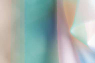 Bulanık, değil keskin netlik. Doku, arka plan, desen. İpek kumaş şeffaf, sarı-pembe yeşil mavi olduğunu. Soyut yumuşak şifon doku arka plan. 