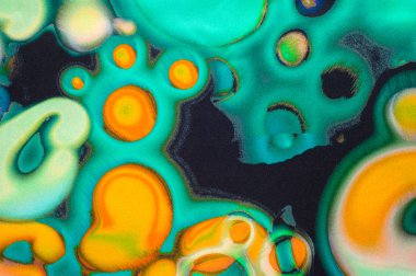 Doku, arka plan, desen. Kumaş turkuaz. Bulanık renkleri, sarı, kahverengi, yeşil, salata daireler şeklinde soyut desen