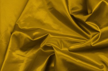 Doku, arka plan, desen. Sarı saten ipek bir kumaştır