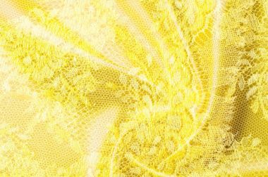 Arka plan doku, desen. Dantel sarı kumaştır.