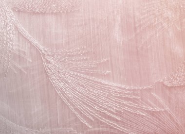 Doku, arka plan, desen. Pastel pembe tonları tül. Arka plan pembe kumaş. Yumuşak doku kumaş, pembe pastel tonu. Eski püskü şık tarzı. Arka plan olarak buruşuk tül.