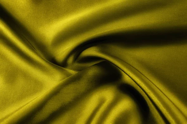 Soft focus. texture, pattern. cloth silk yellow. Mustard washed