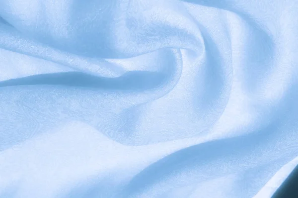 Textúra, háttér, minta. Szövet - selyem fény. Halvány kék col — Stock Fotó