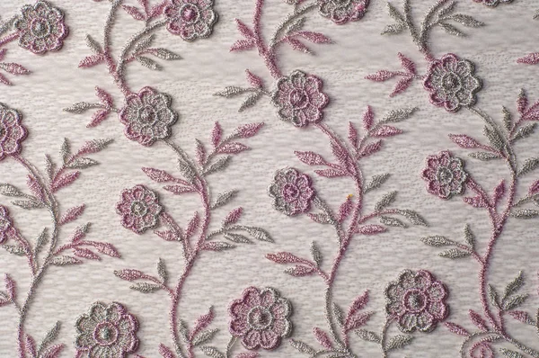 Texture, sfondo, pattern. Laccio rosa decorato con fiori o — Foto Stock