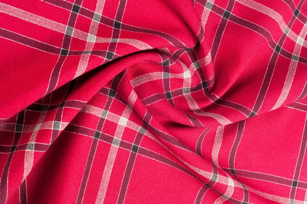 texture, pattern. Scottish tartan pattern. Red and black wool plaid print as background. Symmetric square pattern. yarn dyed flannel is brushed on both sides and perfect for button down shirts,