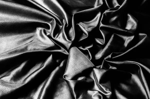 テクスチャ パターン 黒のシルク生地 高貴なストレッチ生地の絹エラステン サテン黒流れる — ストック写真