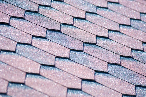 An asphalt shingle is a type of wall or roof shingle that uses asphalt for waterproofing. They are one of the most commonly used roofing covers in North America