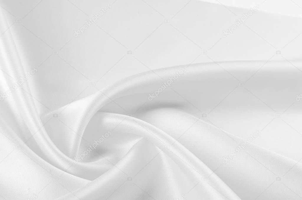 Texture, background, pattern. White silk fabric, Smooth elegant 