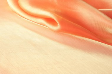 Doku, arka plan, desen. Perdelik arka plan için turuncu ipek kumaş. Kumaş alev arka plan, sanatsal sallayarak bez fraktal desen