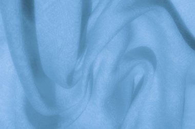 Doku, arka plan, desen. Kumaş - ipek ışık. Soluk mavi renk. İpek Dupioni solgun su mavi renkte