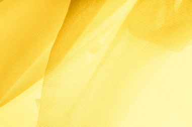 Doku, arka plan, desen. İpek kumaş dokusuna sarıdır. İpek kumaş şeffaf.