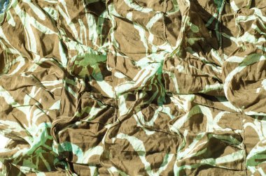 Doku, arka plan, desen. Kadın etek. Kumaş Pamuk koruyucu renk haki. Mat kahverengi-sarı renkli, özellikle, bir güçlü pamuk kumaş tekstil kumaş olduğunu