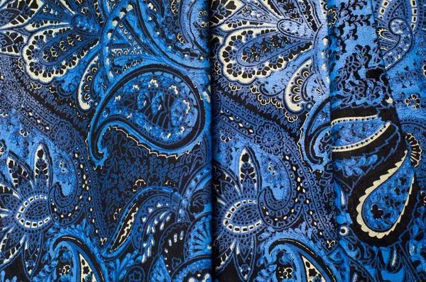 Background texture, Fabric blue paisley. Designed for Fabri-Quil