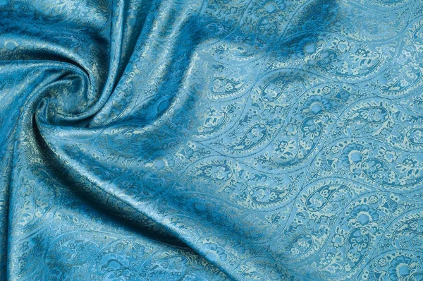 Background texture, pattern. Blue paisley silk chiffon mod fabric by the yard. Crinkled, flowy, soft, very light,