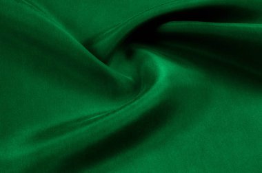 Arka plan doku, desen. Kalın kalın ipek kumaş yeşildir. T