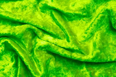 Doku, arka plan, desen. Yeşil kadife kumaştır. Mikro kadife kumaş bir ipeksi pürüzsüz hissi veriyor bir yüksek kaliteli polyester kumaş olduğunu.