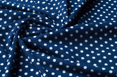 Doku. Arka plan. Çizim. Kumaş ipek beyaz bezelye mavi