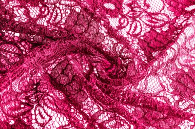 Doku, arka plan, desen. Kumaş kırmızı dantel. Arka planını dantel kumaştan gül stilize. Çiçekli soyut dantel modeli. Duvar kağıdı, iç çamaşırı ve takı. Davetler