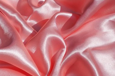 Doku, arka plan, desen. Astar kadın elbise ışık turuncu, turuncu bez astar. Kumaş mercan ipek