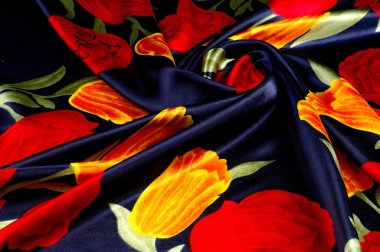 Doku, arka plan, desen. Kumaş - ipek kadın mendil. Parlak sarı kırmızı lale mavi bir arka plan üzerinde çizim. Tapınak çiçekler mor sarı dans Lale Çiçek kumaş