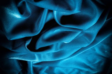 Doku, arka plan. şablon. İpek kumaş mavisi, mavi ipek kumaş ve avludaki döşeme kumaşı - koyu perdeler - sırt ve yastıklar için katı kumaşlar
