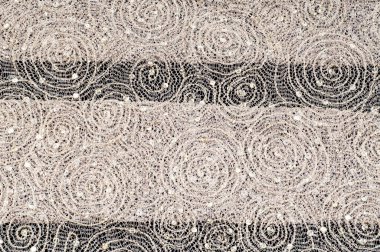 Doku, kumaş, arka plan. Altın iplik iplik ile bir daire desenli dantel kumaş