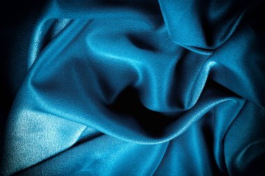 Doku, arka plan. şablon. İpek kumaş mavisi, mavi ipek kumaş ve avludaki döşeme kumaşı - koyu perdeler - sırt ve yastıklar için katı kumaşlar