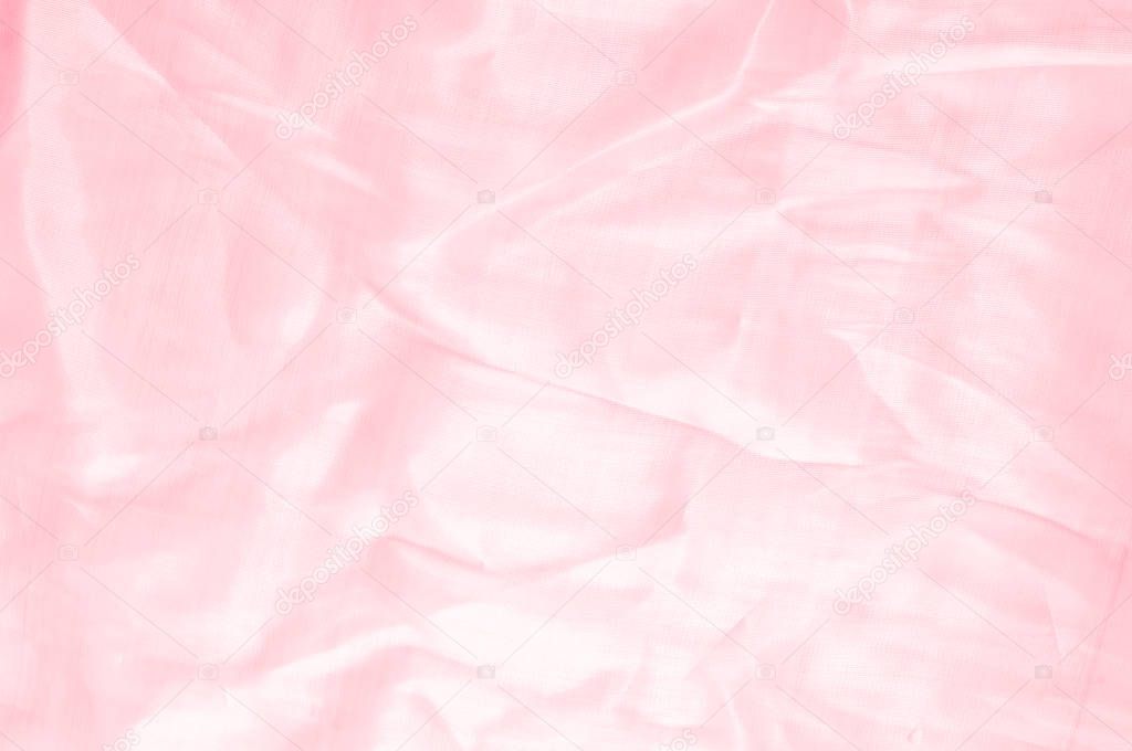 Background texture, pattern. Cloth pink silk. Smooth elegant pink silk or satin can use as wedding background. Luxurious valentine day background design.