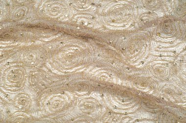 Doku, arka plan, desen. Dantel kumaş bej parıldıyor ile altın. Muhteşem ışıltılı çiçek dantel antik şekerleme renkli Edwardian dönemi ruhu içinde altın metalik iplik ile. 