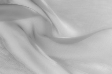 Doku, arka plan, desen. Beyaz ipek şeffaf kumaş dokusu. Bu gergin bir tül, büyük elbiseler ya da takım elbise, şeffaflık ve akış gerekli nerede olduğunu.