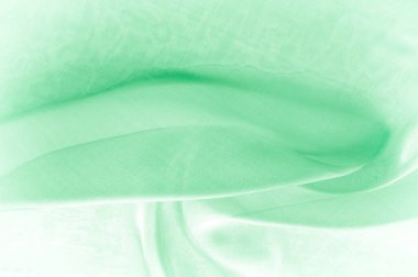 Arka plan doku, desen. Bazı yumuşak kıvrımlar ve vurguları olan yeşil ipek arka plan. yeşil arka plan soyut bez ya da sıvı dalga illüstrasyon ipek doku saten dalgalı kıvrım 