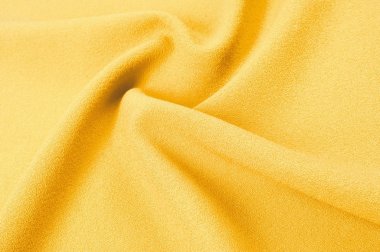 Doku, arka plan, desen. Sarı ipek kumaş. Pürüzsüz zarif altın ipek arka plan olarak kullanabilirsiniz. Altın saten Tekstil arka plan. 