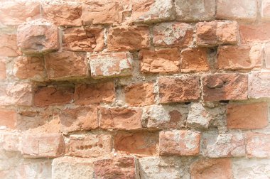 Doku, arka plan, desen. Pitoresk eski yıkık tuğla duvar. 