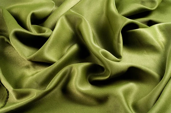 Textur, Hintergrund. Vorlage. Tuch Seide grün, crepe de chine. — Stockfoto