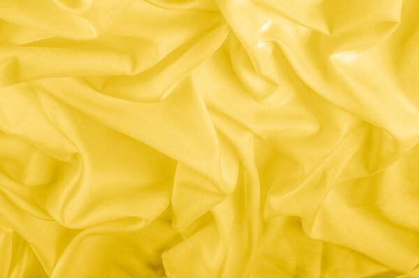 texture. silk fabric - yellow. This shiny material has a really soft and smooth surface texture that is guaranteed to add style and glare to your design