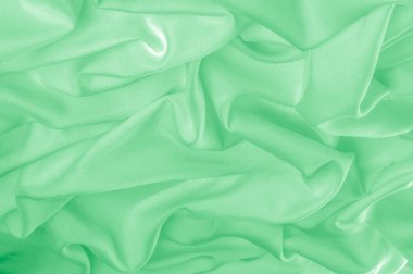 doku. ipek kumaş yeşildir. Son derece yumuşak ve ince, bu şifon şifon kaçırmayın. Yavaşça bir sonraki birlikte fade çiçeklerle, çarpıcı bir tasarım oluşturmak