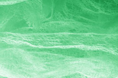 Örgü yeşilli kumaş. Sizin için ruhani parlaklık bir çizgi ekleyin