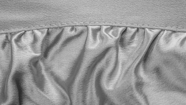 Patterned fabric with gray texture. This versatile fabric has ma — Stock Photo, Image