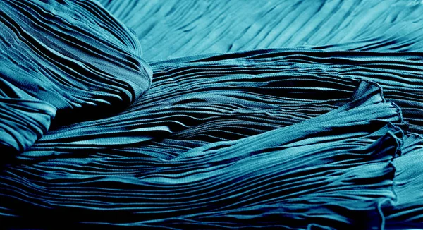Текстура, фон, візерунок, тканина плісе синій. Блискуча обробка — стокове фото