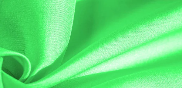 Tekstur, latar belakang, pola, kain sutra berwarna hijau. Ini... — Stok Foto
