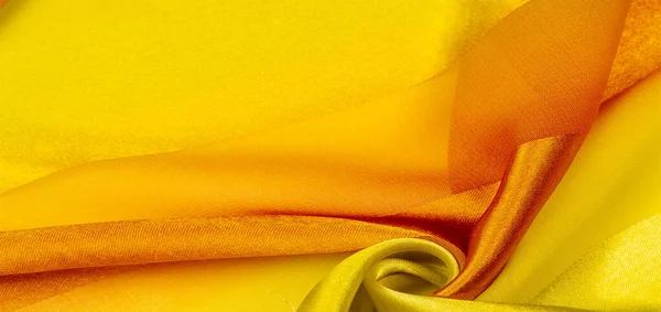 Textura, fondo, tela a rayas de seda amarilla con un — Foto de Stock