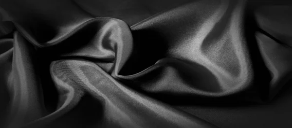 Textura, fundo, padrão. Tecido de seda preta. É preto e — Fotografia de Stock