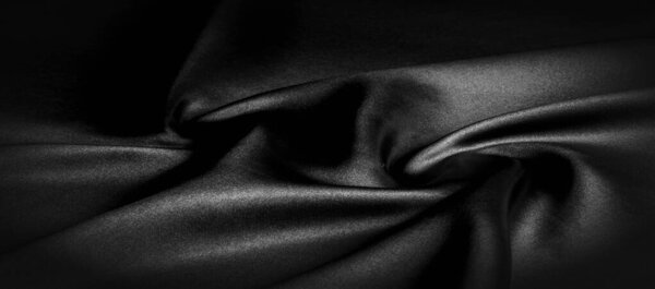 texture, background, pattern. Black silk fabric. It is black and