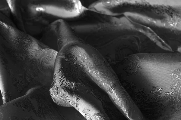 Υφή, φόντο, μαύρο ατσάλι γκρίζο ύφασμα με ένα Λαχούρι — Φωτογραφία Αρχείου
