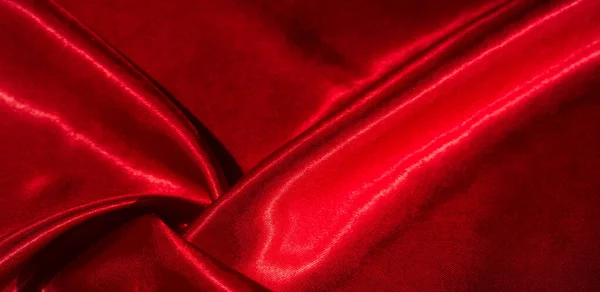 Texture, background, pattern, silk fabric of red color. This ado — Stock Photo, Image